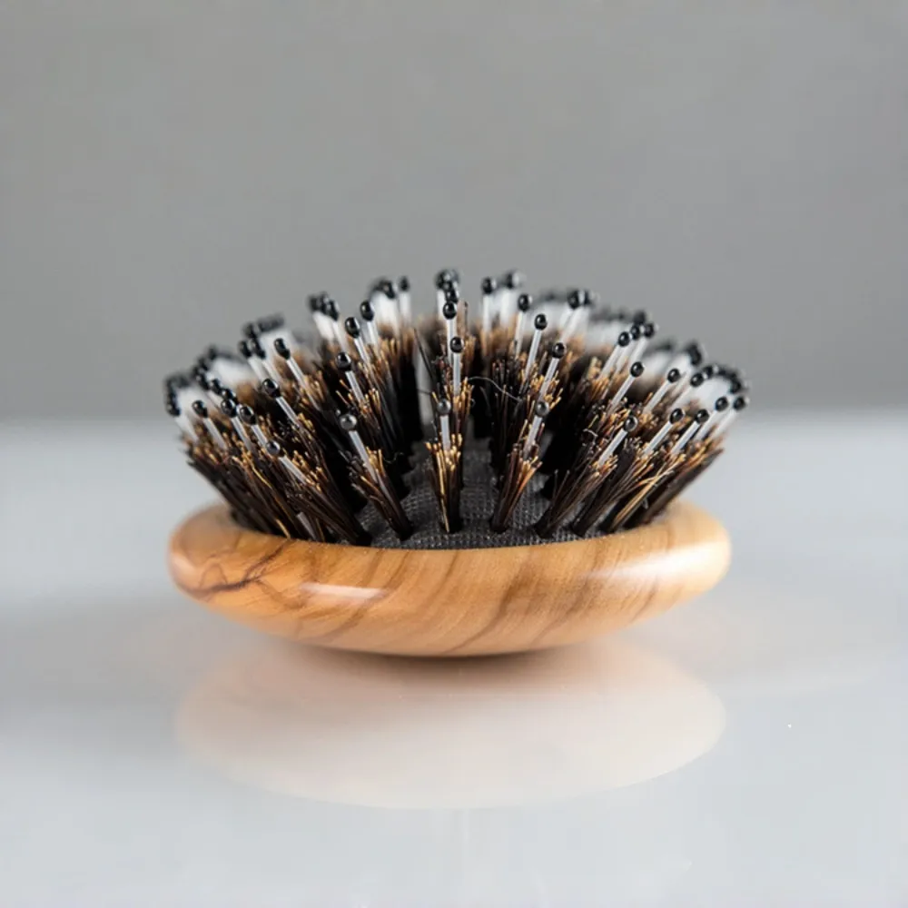 BSFL premium boar bristle hair brush featuring scalp-friendly ball-tipped bristles.