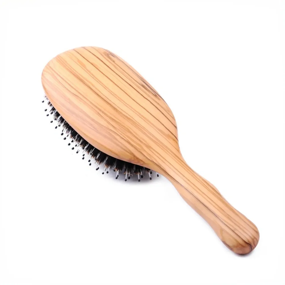 Back view of BSFL artisanal olive wood paddle brush with minimalist wood grain design.