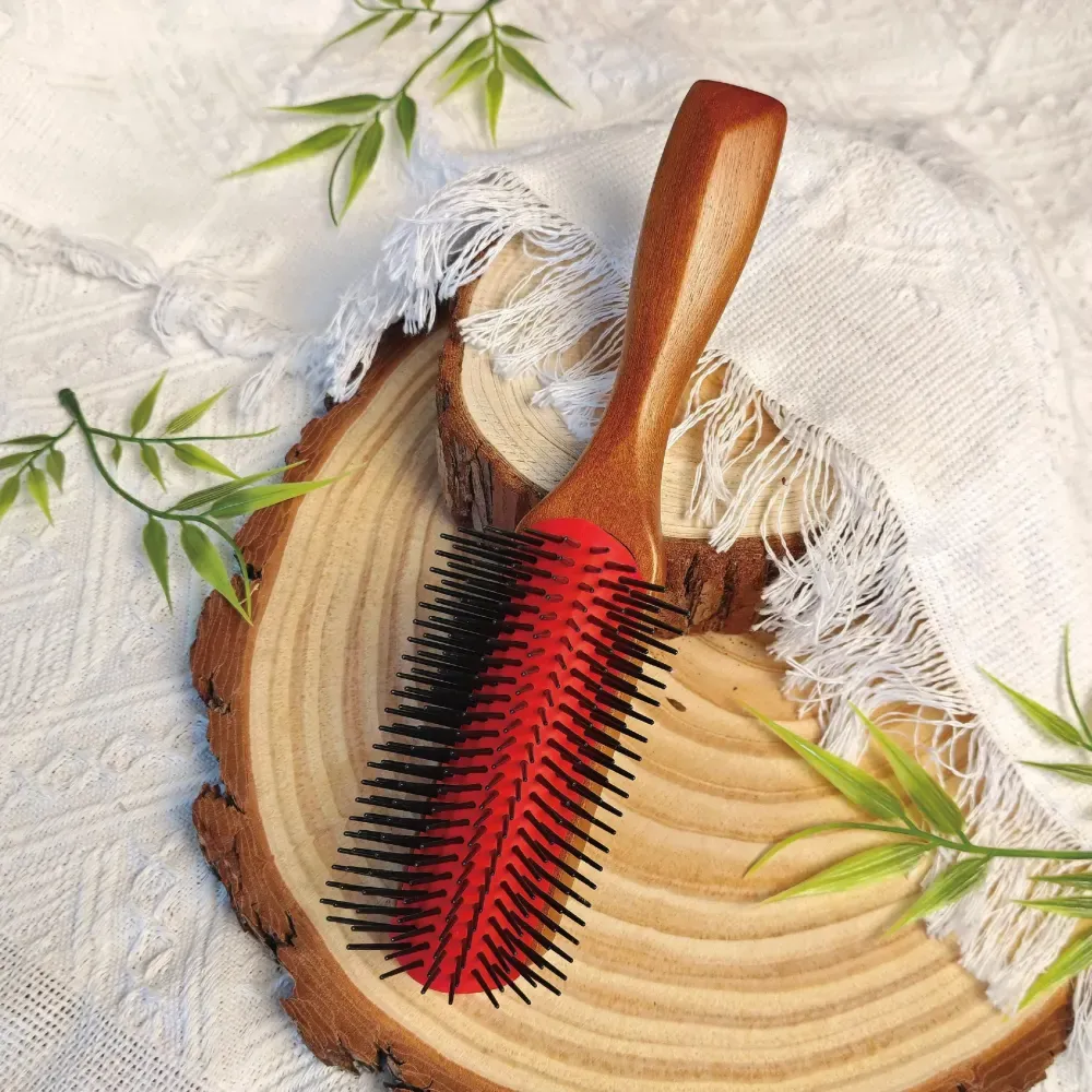 BSFL 9 row styling hairbrush on natural wood tray and fabric setup