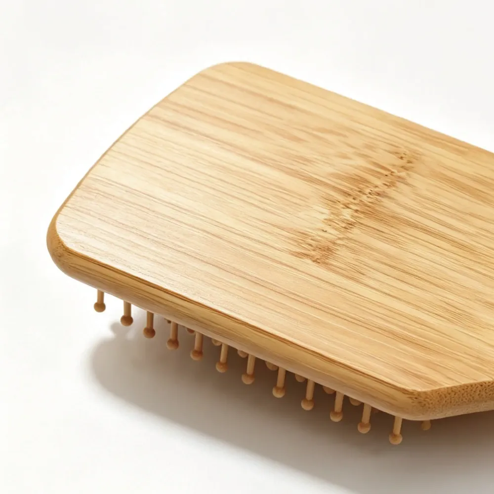 BSFL bamboo paddle hairbrush back view showing solid bamboo texture