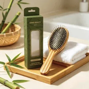 BSFL boar bristle hairbrush next to custom green window box on wooden tray